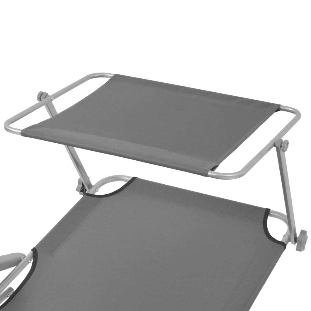 Sun lounger with grey steel canopy