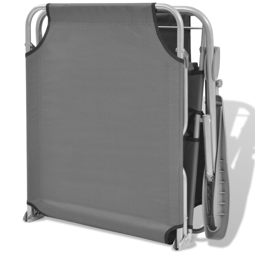 Sun lounger with grey steel canopy