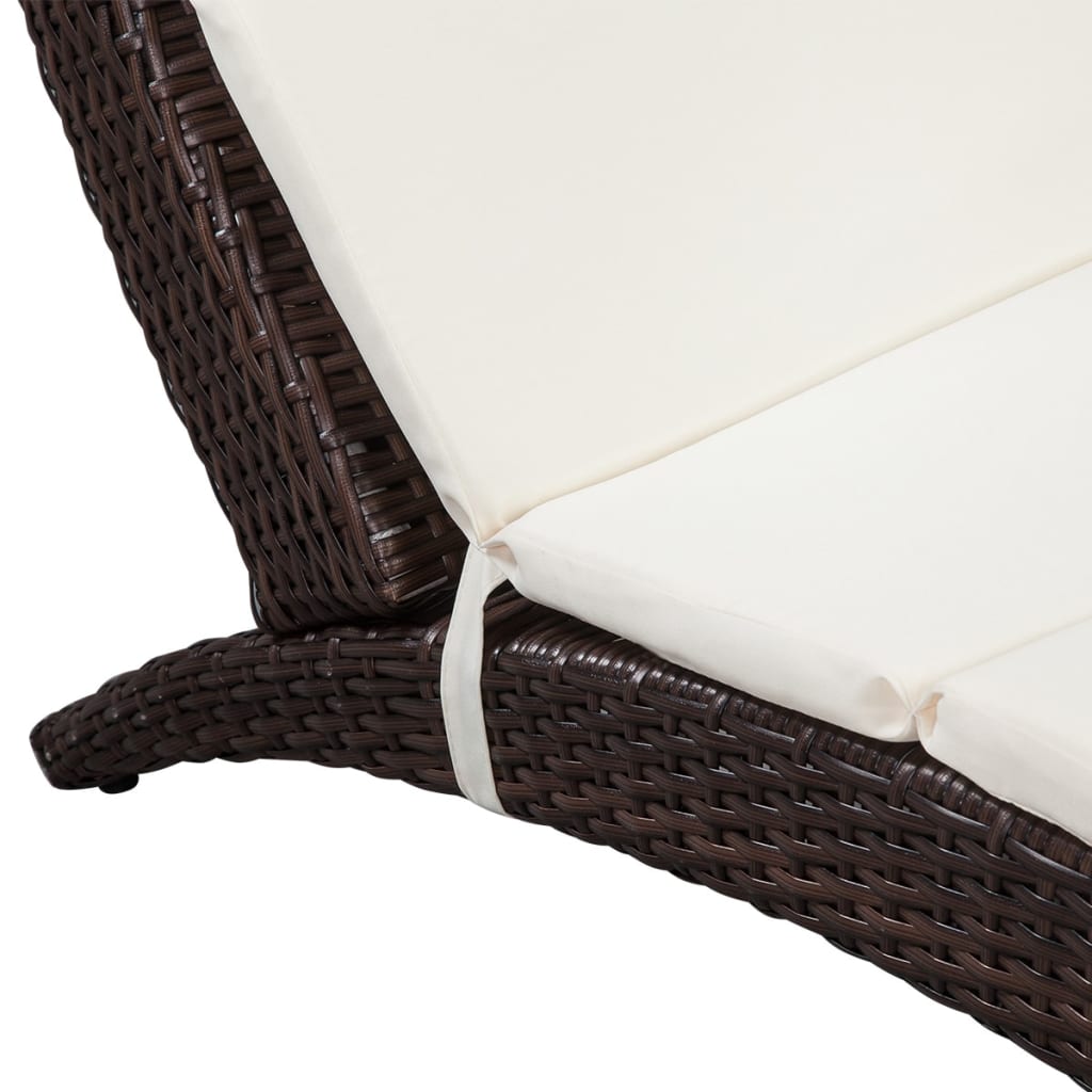 Folding sun lounger with cushion in brown PE rattan