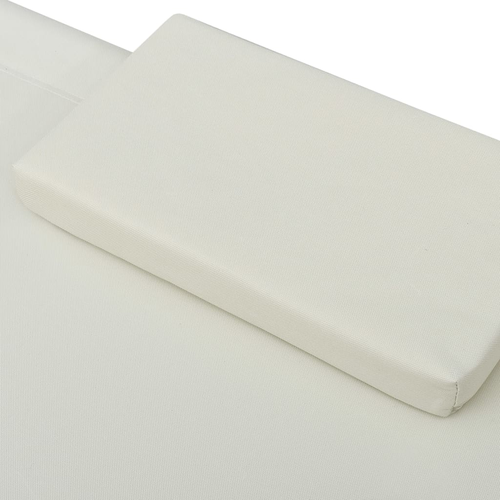 Sun lounger with canopy and cream white cushion