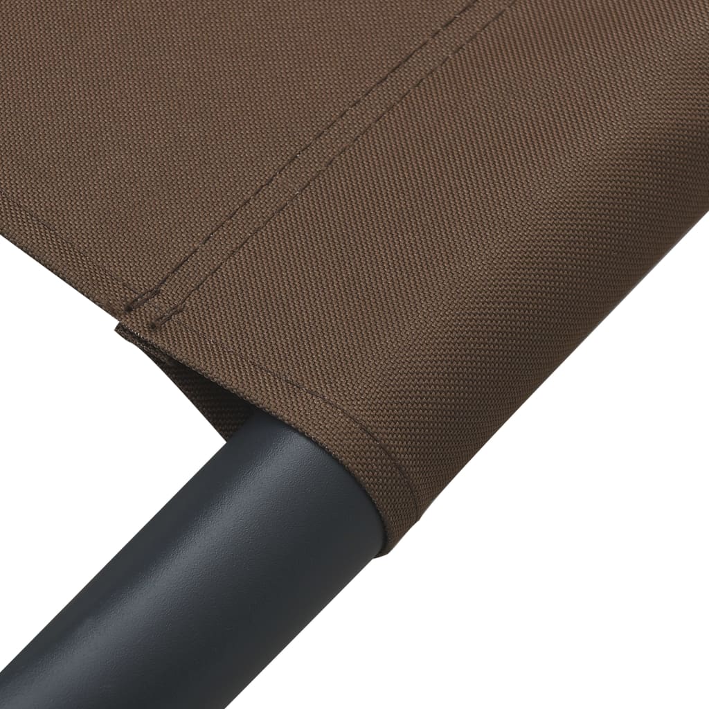 Sun lounger with canopy and brown cushion
