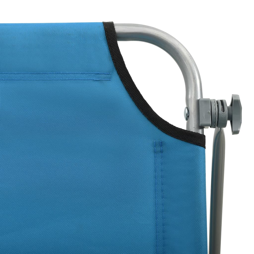 Sun lounger with blue steel canopy