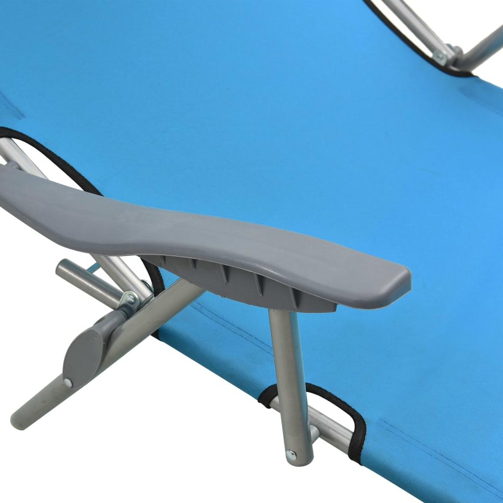 Sun lounger with blue steel canopy
