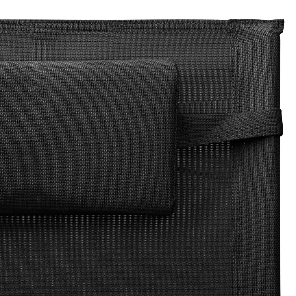 Black and grey textilene sun lounger