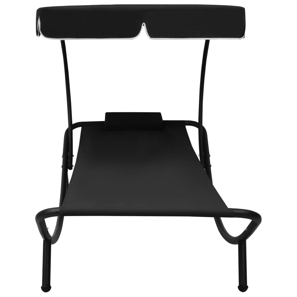 Sun lounger with canopy and black cushion