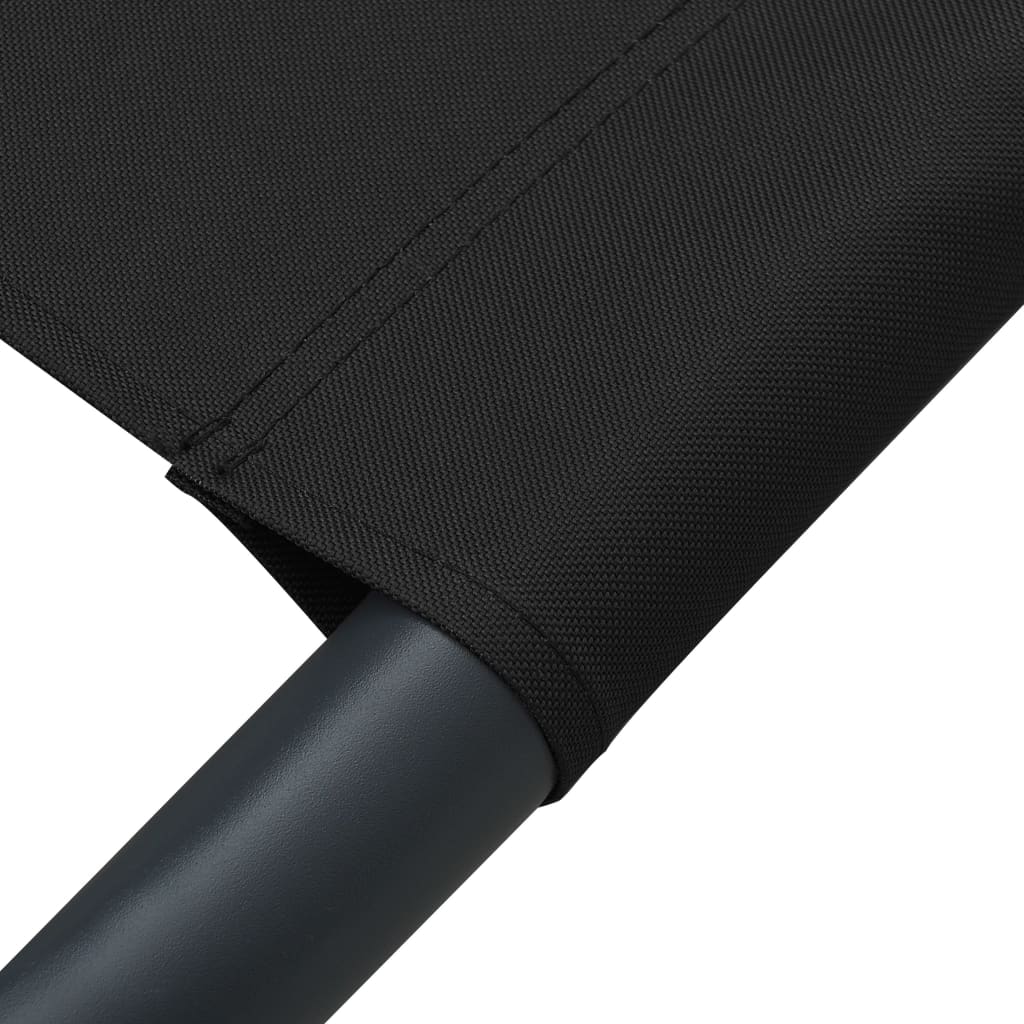 Sun lounger with canopy and black cushion