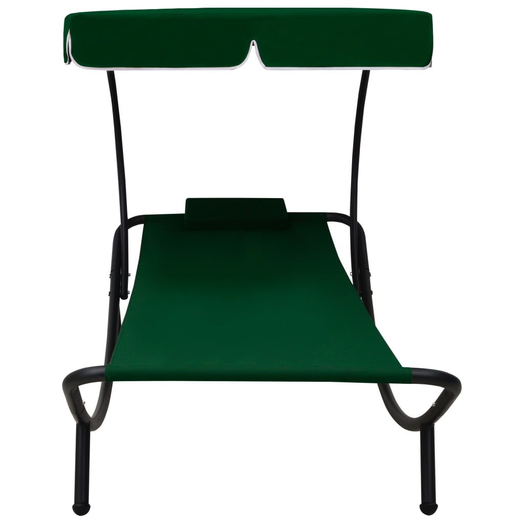 Sun lounger with canopy and green cushion