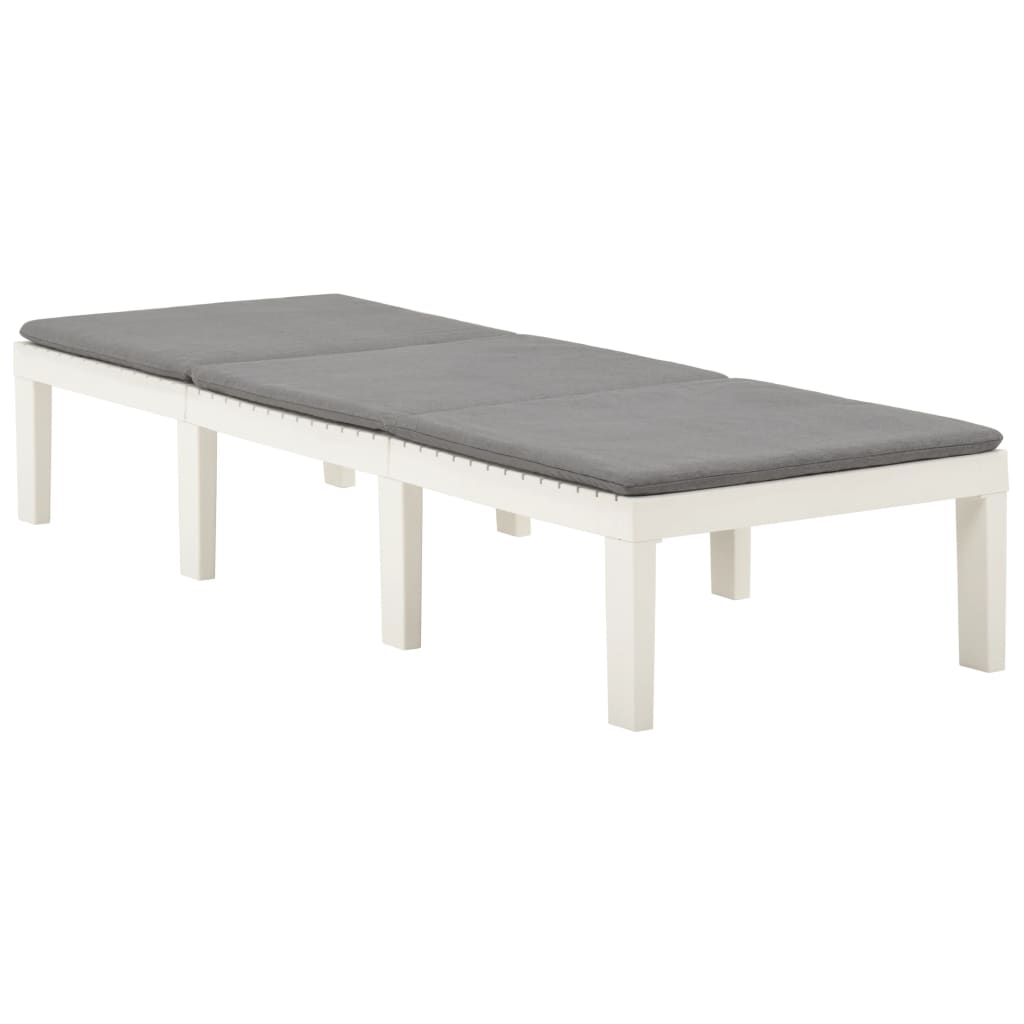 Sun lounger with white plastic cushion