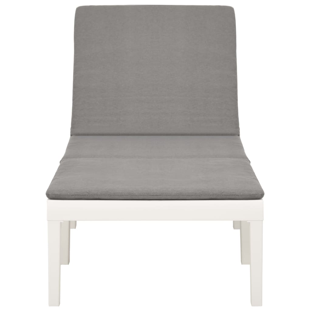 Sun lounger with white plastic cushion