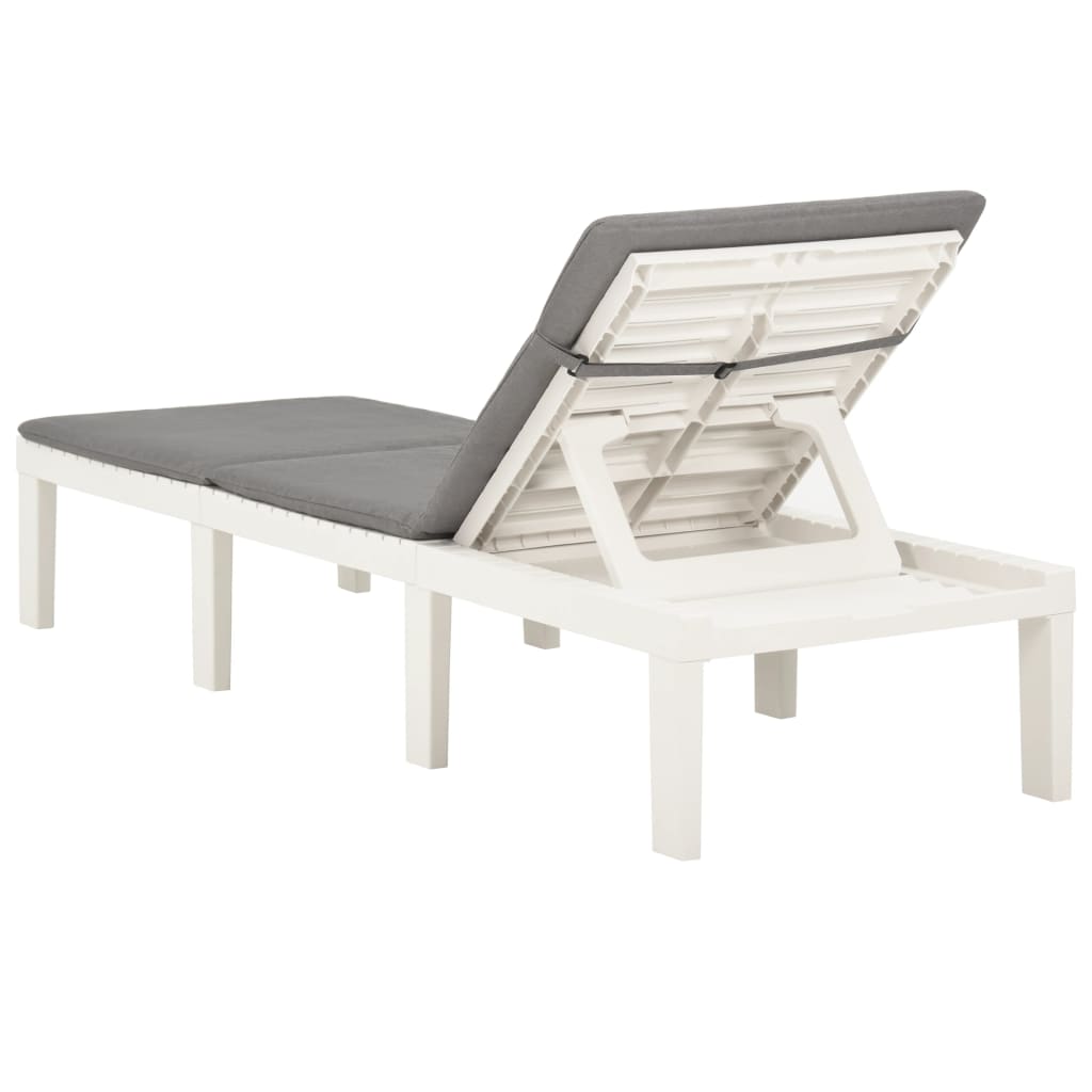 Sun lounger with white plastic cushion