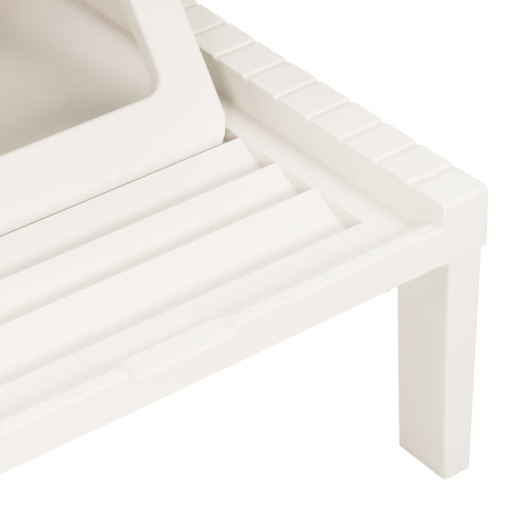 Sun lounger with white plastic cushion