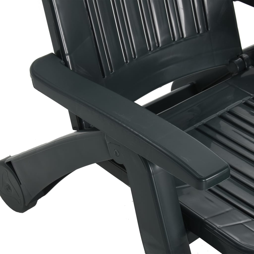 Green polypropylene folding sun lounger