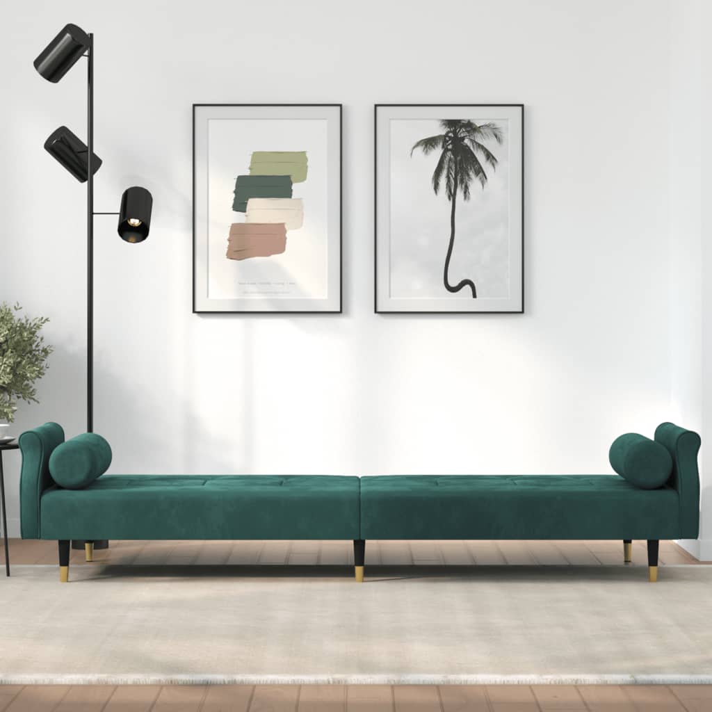 Sofa bed with dark green velvet cushions
