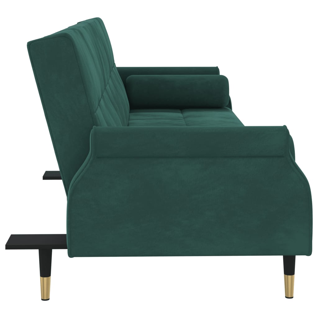 Sofa bed with dark green velvet cushions