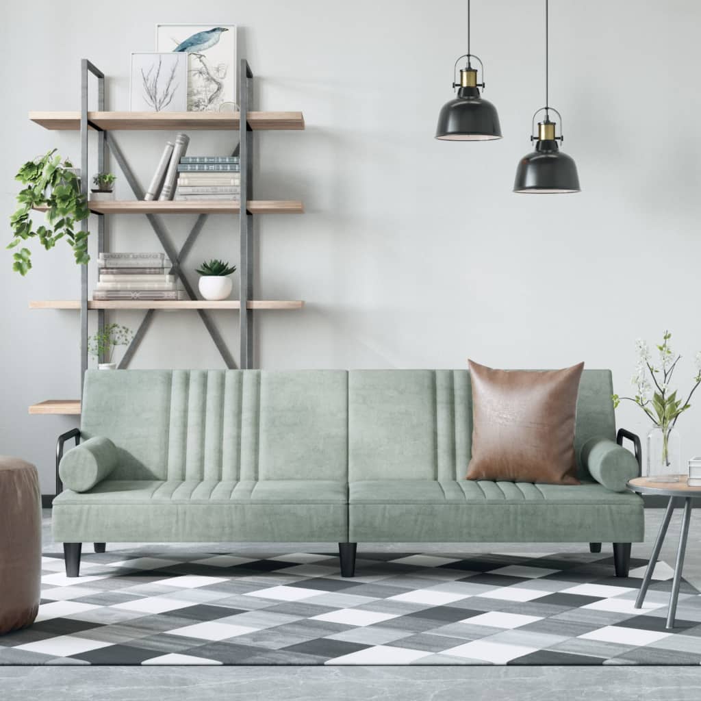 Light grey velvet sofa bed with armrests