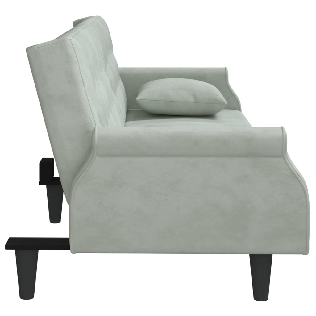 Light grey velvet sofa bed with armrests
