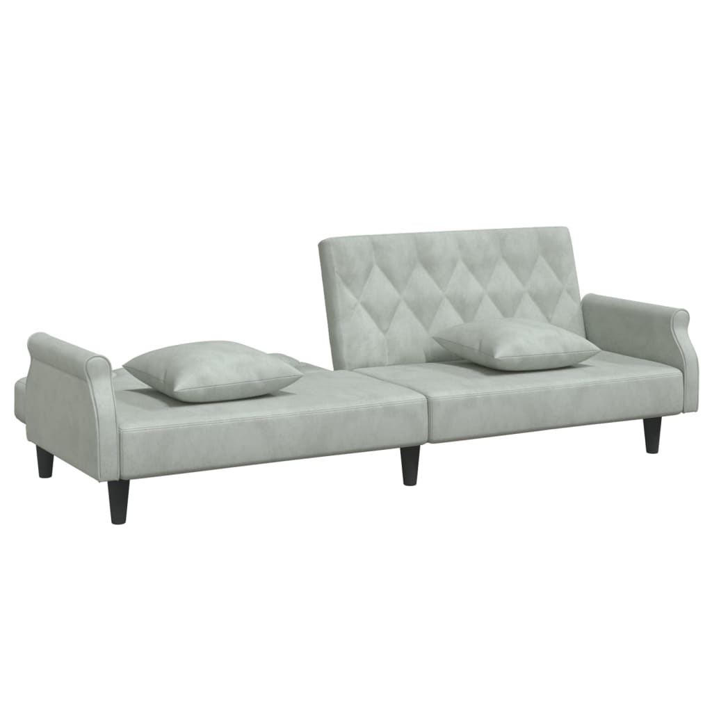 Light grey velvet sofa bed with armrests