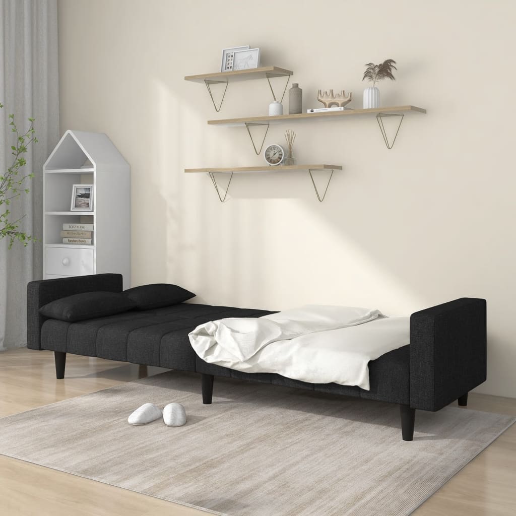 2-seater sofa bed with two black fabric cushions