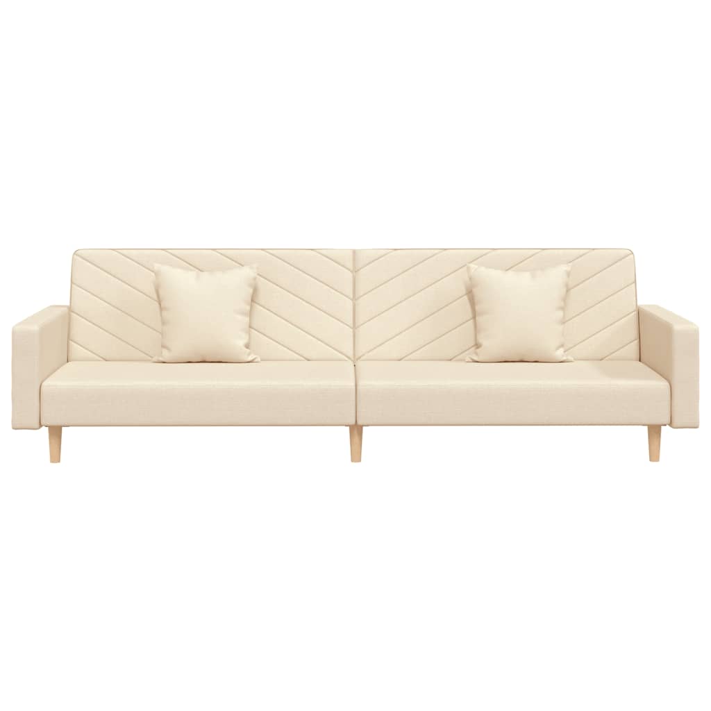 2-seater sofa bed with two cushions in cream-colored fabric