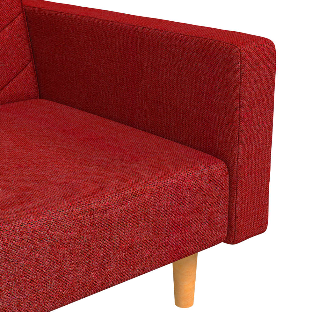 2-seater sofa bed with two cushions in red fabric