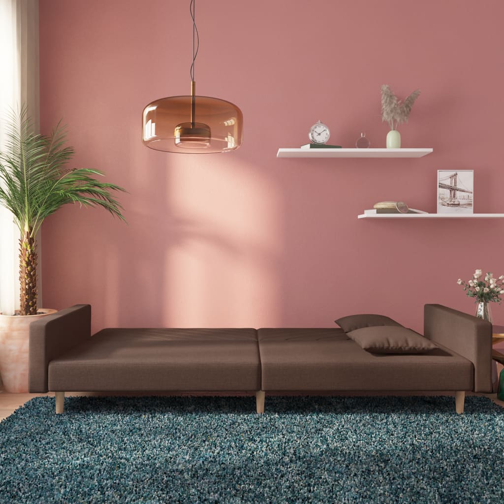 2-seater sofa bed with two cushions in grey-brown fabric