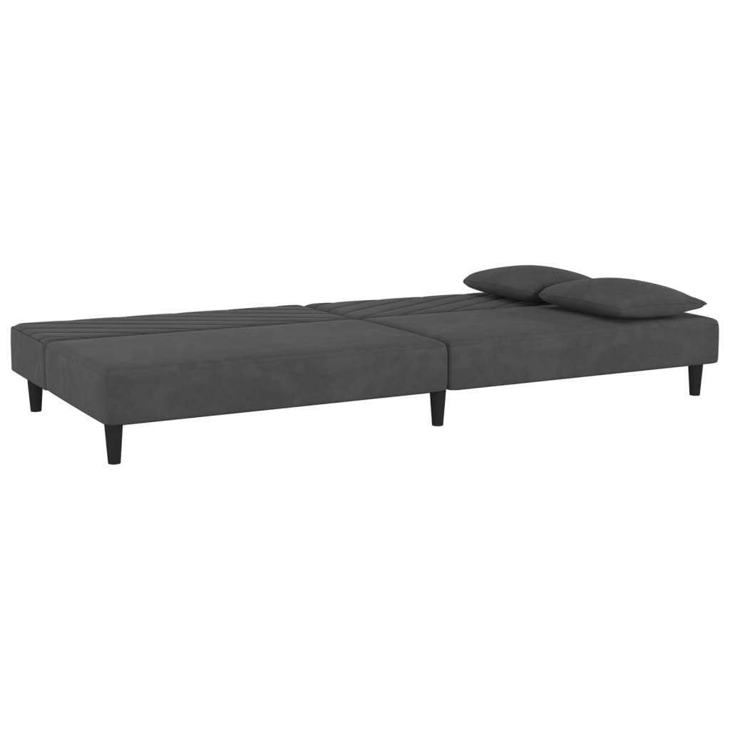 2-seater sofa bed with two dark grey velvet cushions