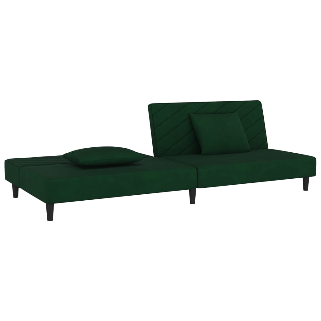 2-seater sofa bed with two dark green velvet cushions