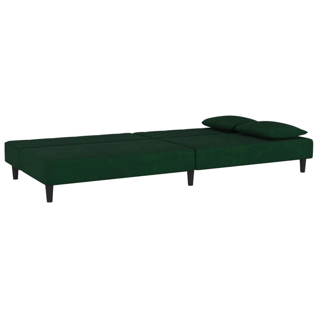 2-seater sofa bed with two dark green velvet cushions