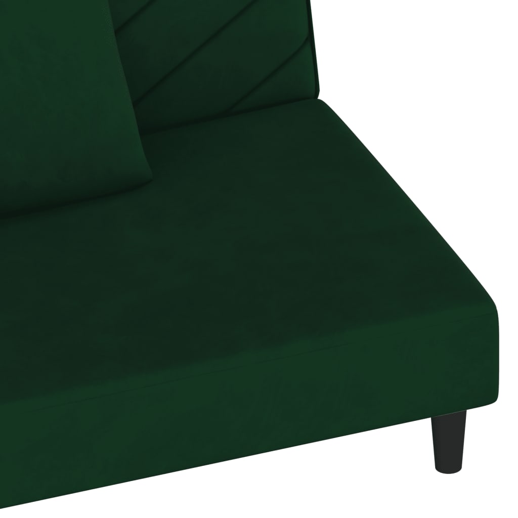 2-seater sofa bed with two dark green velvet cushions