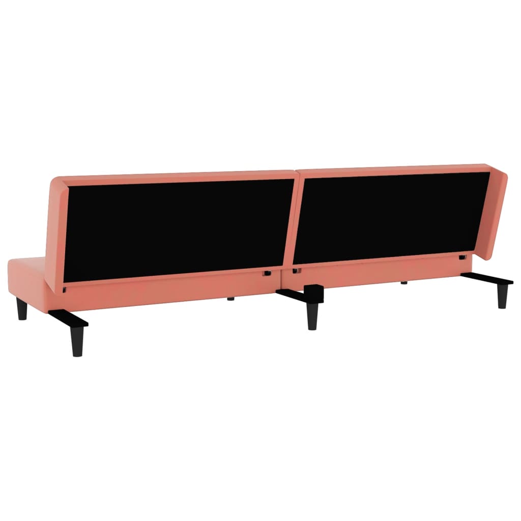2-seater sofa bed with two pink velvet cushions