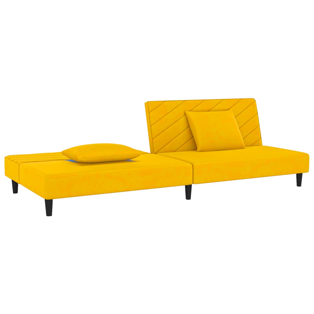 2-seater sofa bed with two yellow velvet cushions