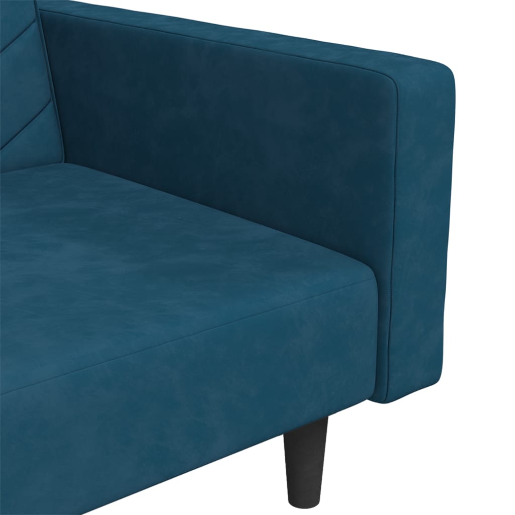 2-seater sofa bed with two blue velvet cushions