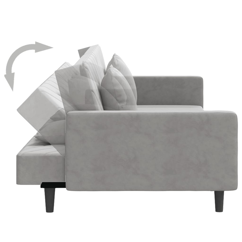 2-seater sofa bed with two light grey velvet cushions