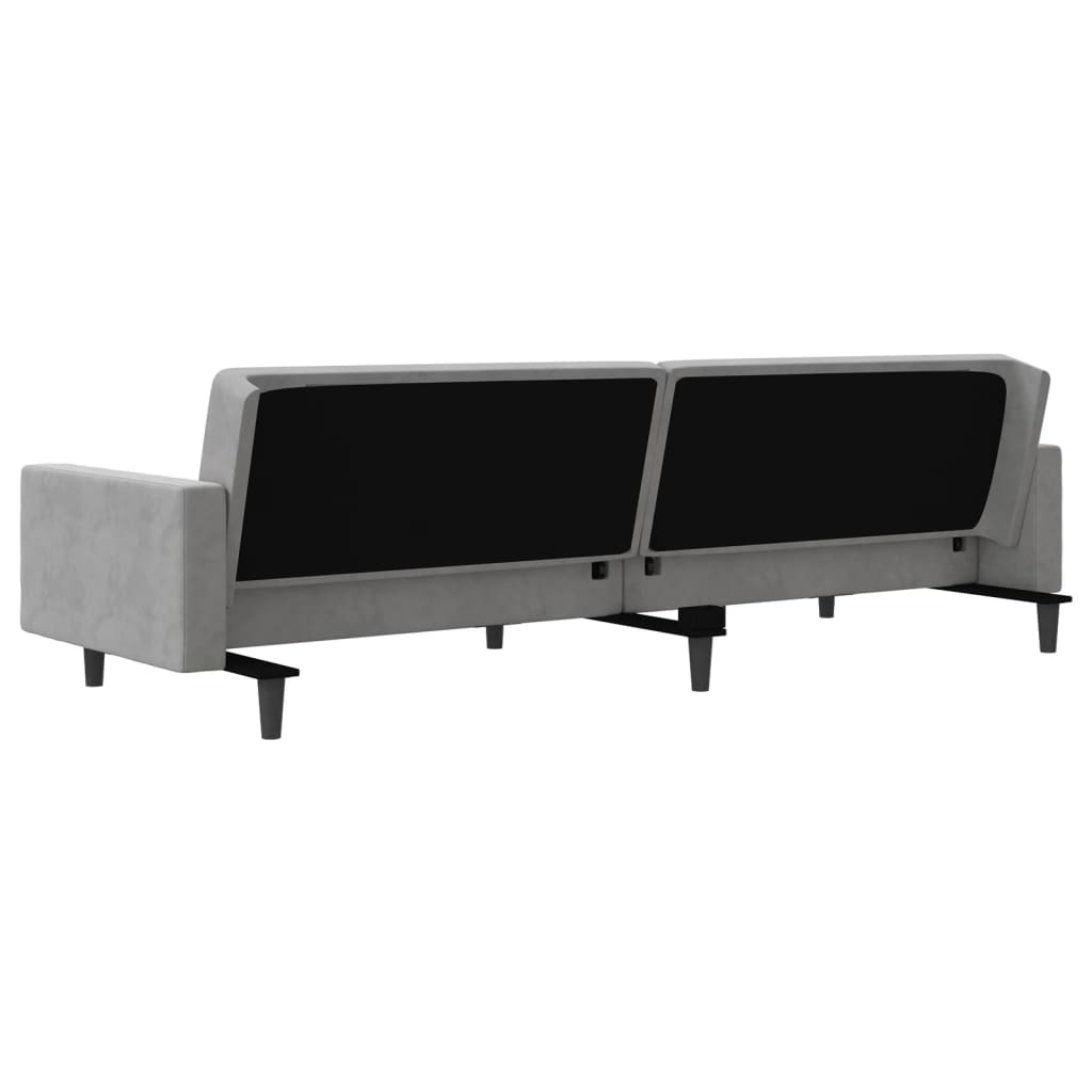 2-seater sofa bed with two light grey velvet cushions