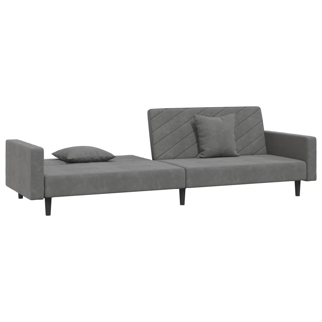 2-seater sofa bed with two dark grey velvet cushions