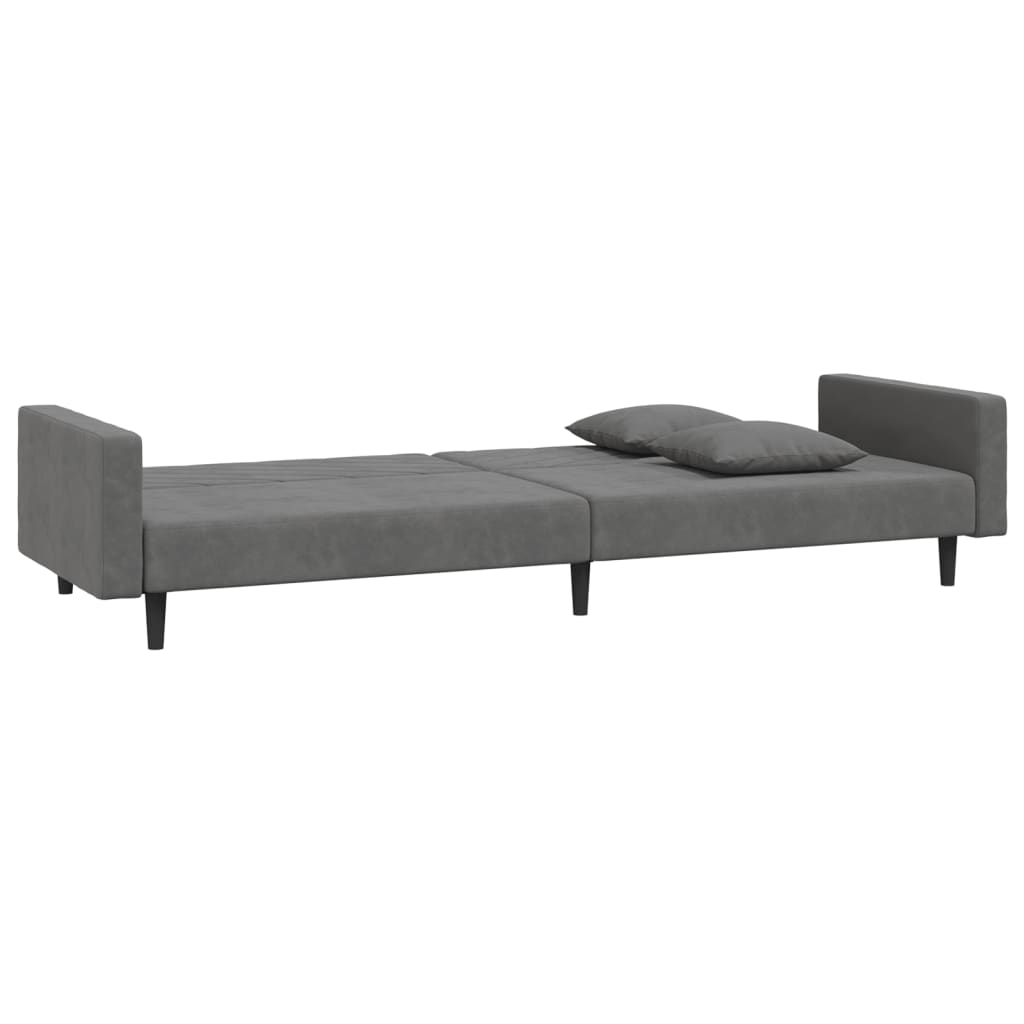 2-seater sofa bed with two dark grey velvet cushions