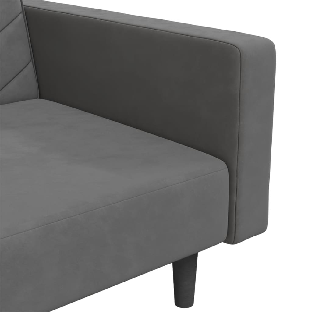 2-seater sofa bed with two dark grey velvet cushions