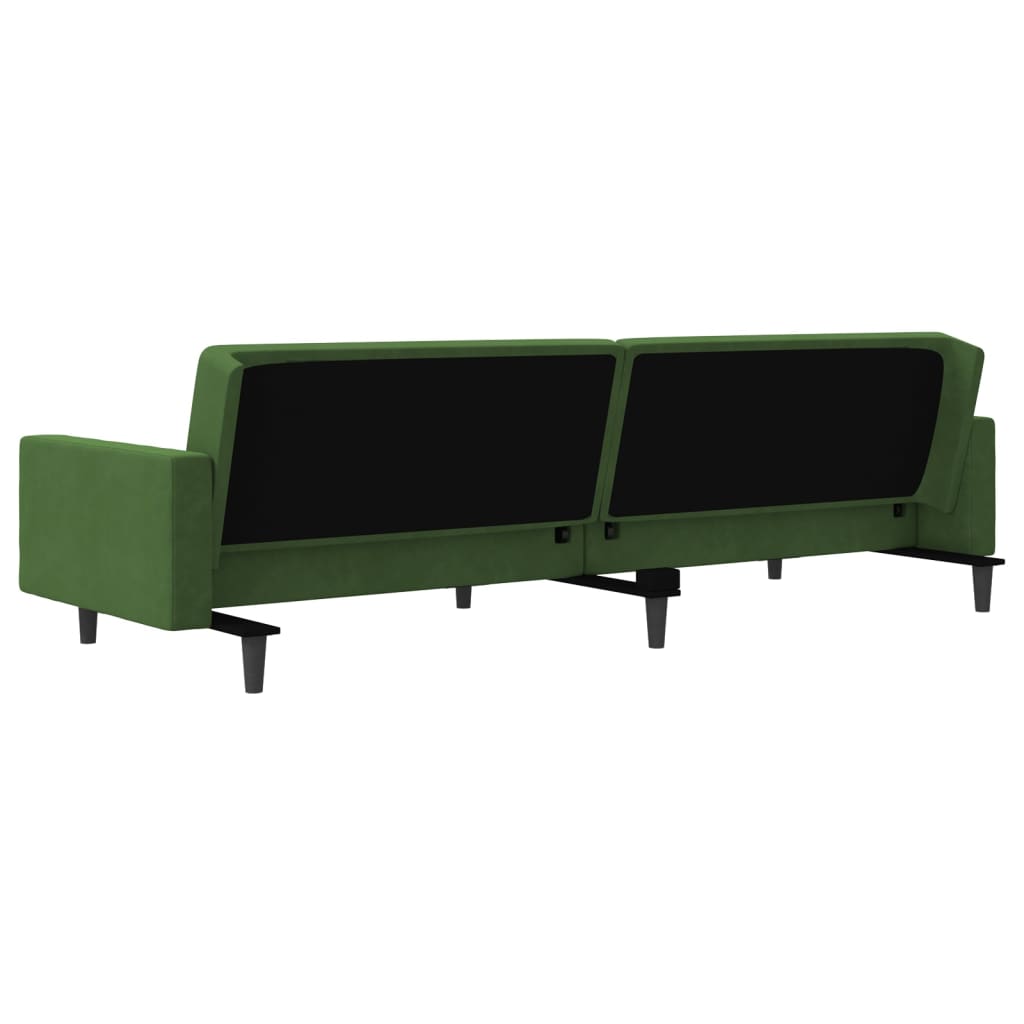 2-seater sofa bed with two dark green velvet cushions