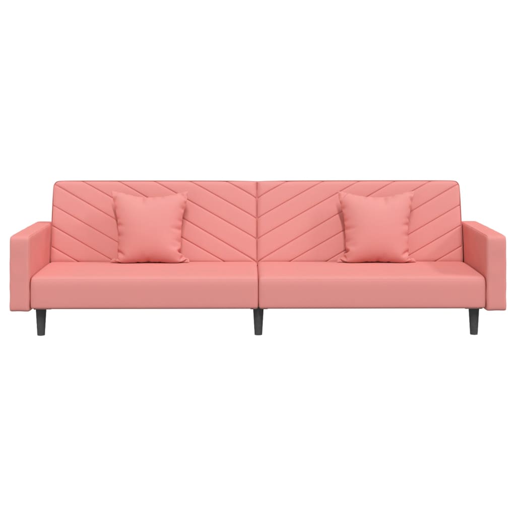 2-seater sofa bed with two pink velvet cushions