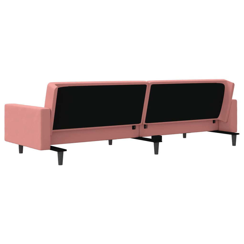 2-seater sofa bed with two pink velvet cushions
