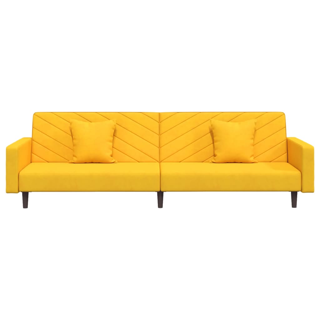 2-seater sofa bed with two yellow velvet cushions
