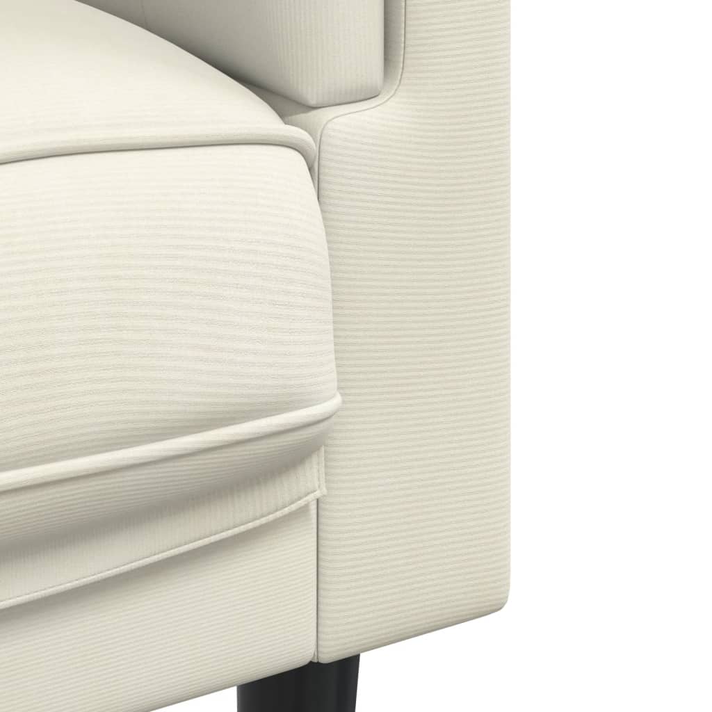 Armchair with cream-colored velvet cushions