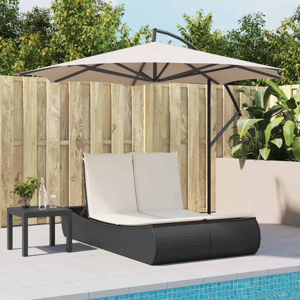 Double sun lounger with cushions in black poly rattan