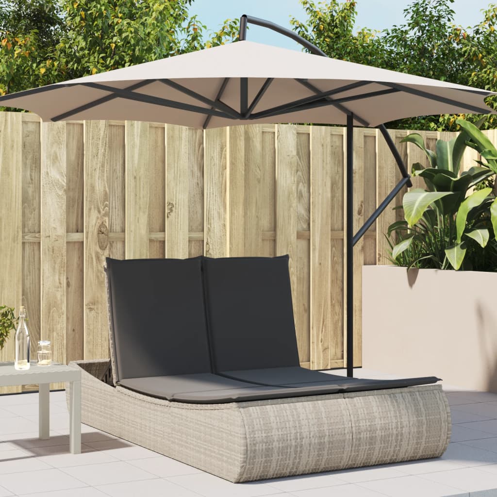 Double sun lounger with cushions in light grey poly rattan