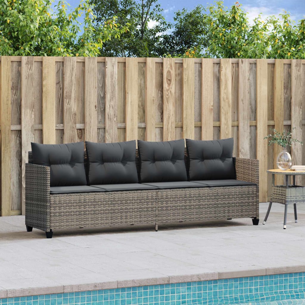 Grey poly rattan sun lounger with cushions