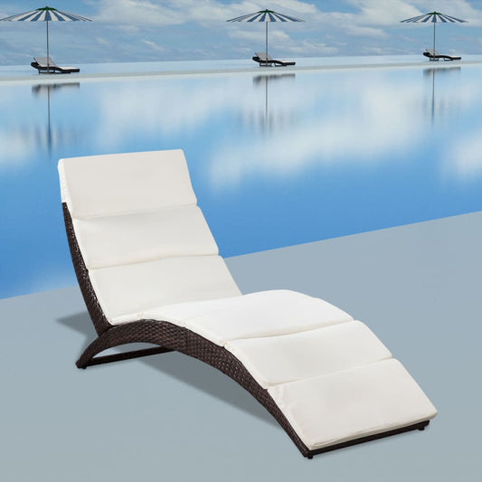 Folding sun lounger with cushion in brown PE rattan