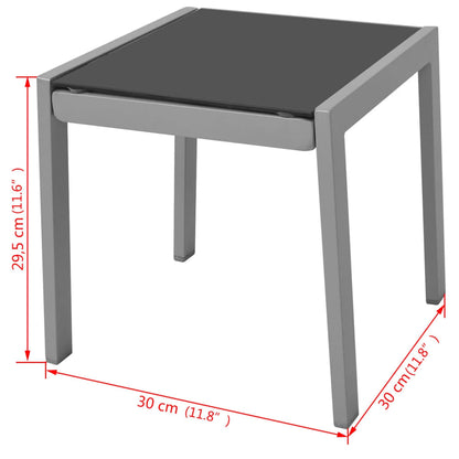 Sun loungers with black aluminum table