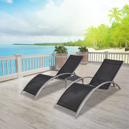 Sun loungers with black aluminum table