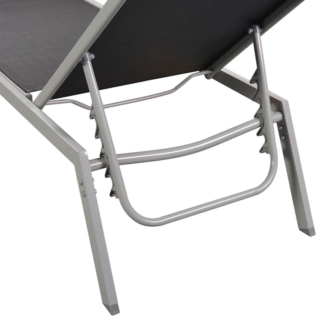 Sun lounger in steel and black textilene