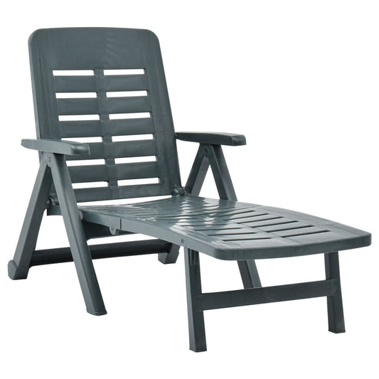 Green plastic folding sun lounger